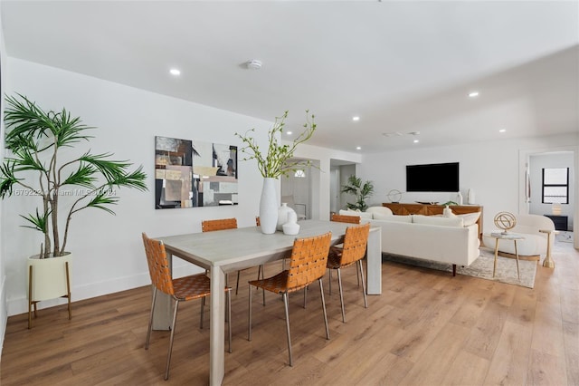 dining room featuring light wood-type flooring