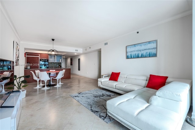 tiled living room featuring ornamental molding