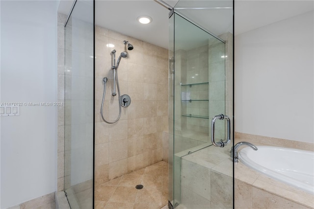 bathroom featuring plus walk in shower