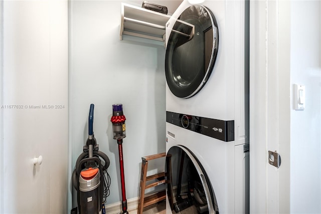 laundry room featuring stacked washer / dryer