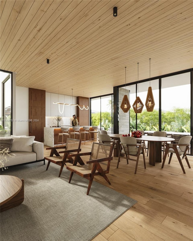 interior space with a wall of windows, light hardwood / wood-style flooring, and wood ceiling