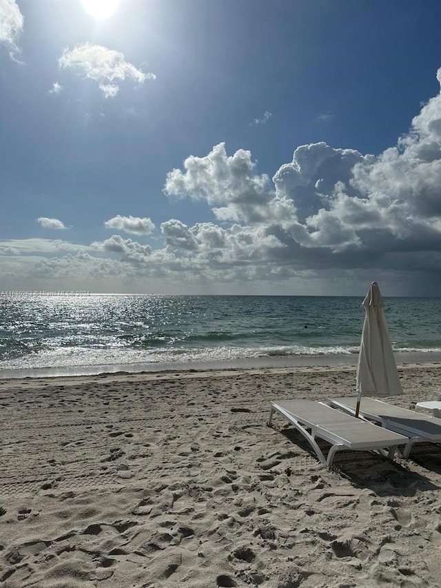 property view of water with a beach view