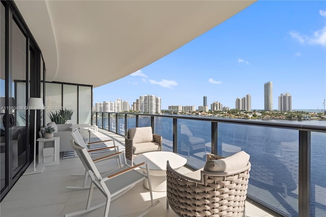 balcony featuring a water view