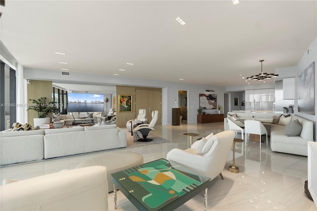 living room featuring an inviting chandelier