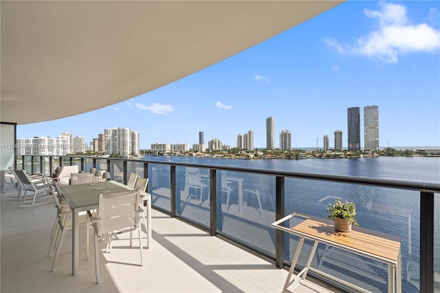 balcony featuring a water view