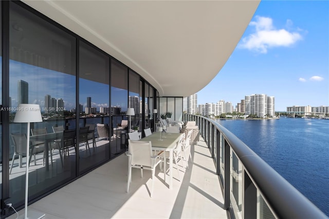 balcony featuring a water view