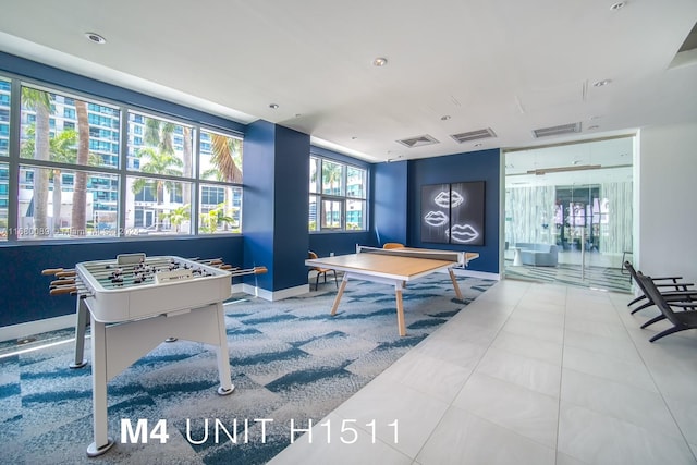 game room featuring tile patterned flooring