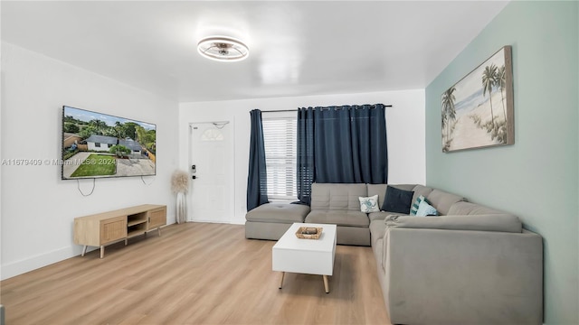 living room with light hardwood / wood-style floors