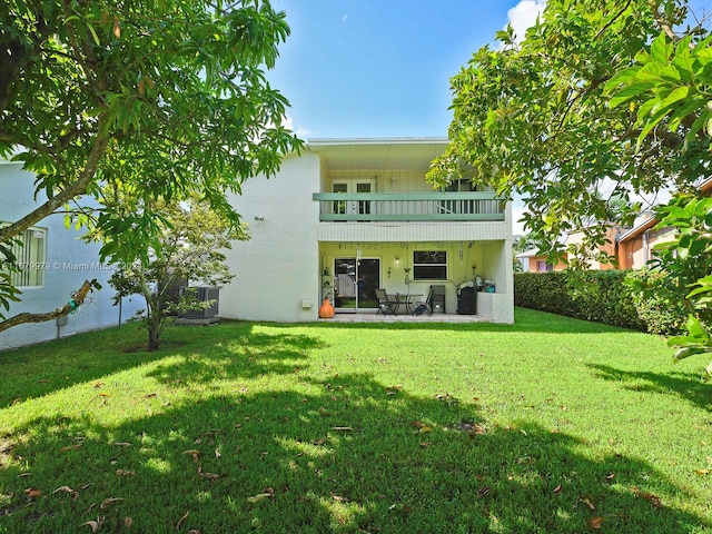 view of yard featuring a patio and central AC unit