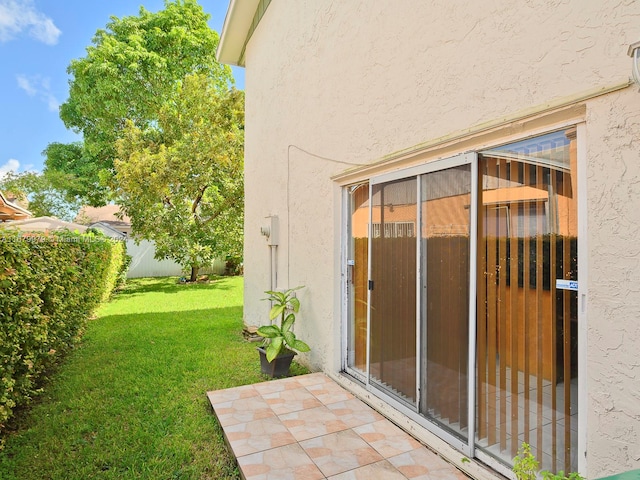 view of home's exterior featuring a lawn