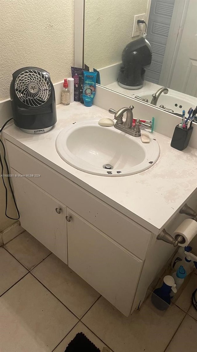 bathroom featuring vanity and tile patterned floors