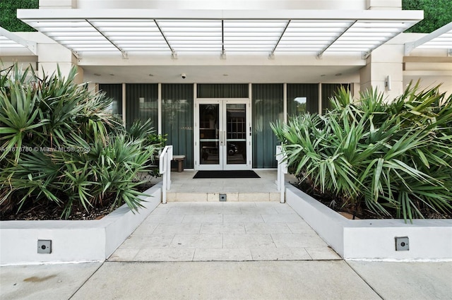 401 N Birch Rd Unit 505, Fort Lauderdale, FL 33304 - property entrance featuring french doors and a surveillance system
