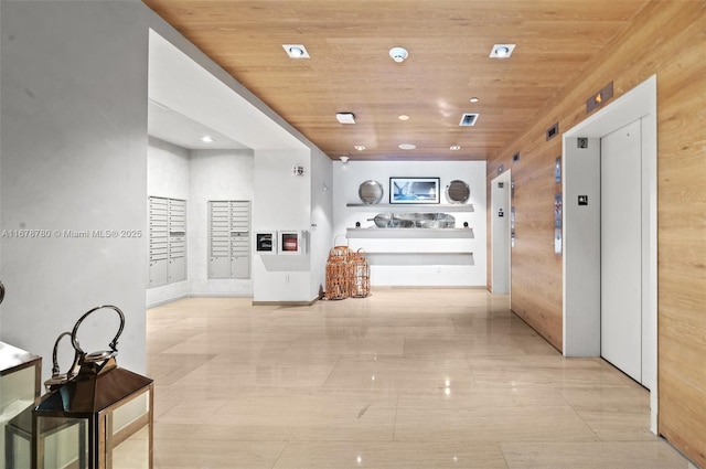 401 N Birch Rd Unit 505, Fort Lauderdale, FL 33304 - hallway with elevator, wood ceiling, and recessed lighting