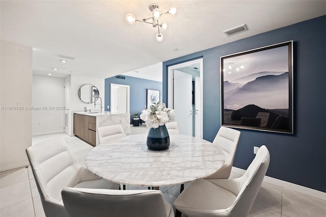 401 N Birch Rd Unit 505, Fort Lauderdale, FL 33304 - dining area featuring baseboards and light tile patterned floors