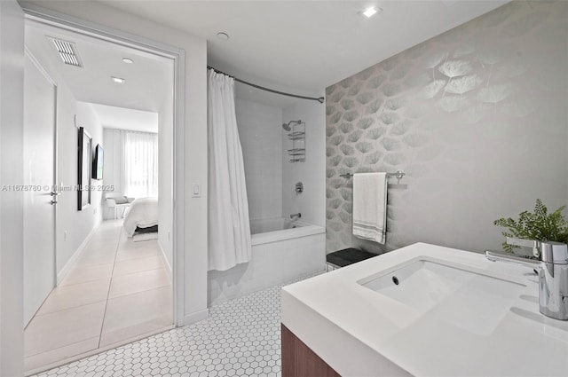 401 N Birch Rd Unit 505, Fort Lauderdale, FL 33304 - full bath featuring vanity, ensuite bathroom, tiled shower / bath combo, and recessed lighting