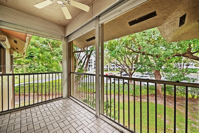 balcony featuring ceiling fan