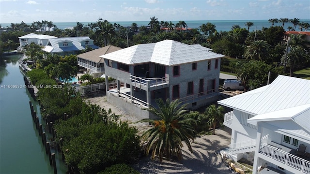 bird's eye view with a water view