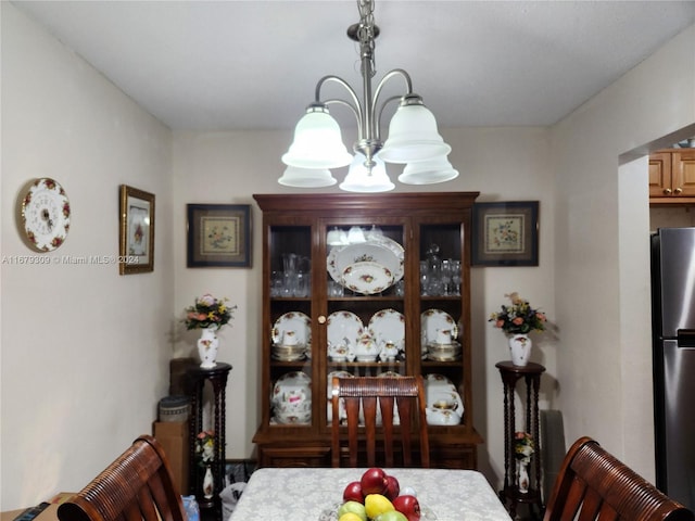 dining room featuring a notable chandelier