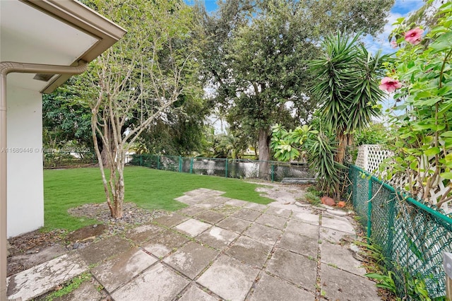 view of patio with a water view