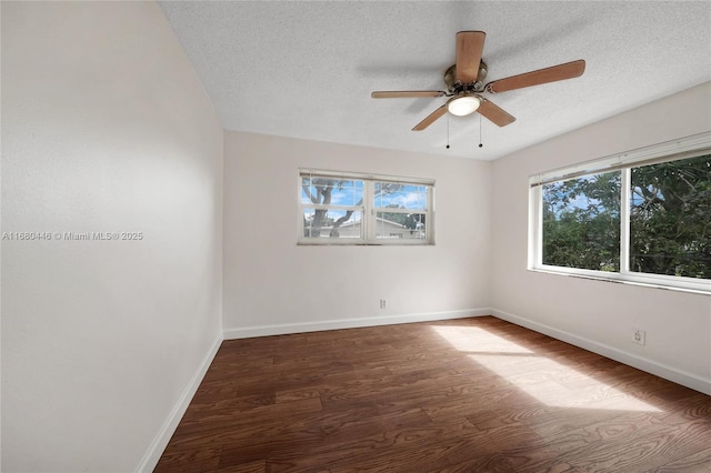 unfurnished room with hardwood / wood-style floors, a textured ceiling, and ceiling fan