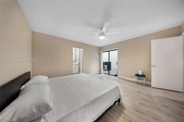 bedroom featuring light hardwood / wood-style floors, connected bathroom, and ceiling fan