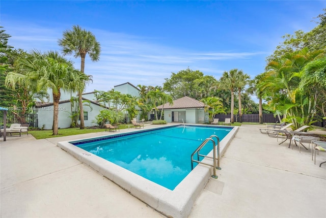 view of pool featuring a patio area