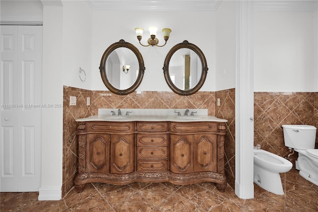 bathroom featuring vanity, toilet, a bidet, and tile walls