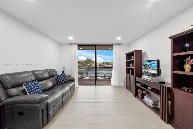 tiled living room with expansive windows