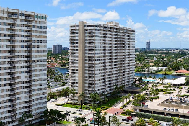 view of building exterior with a water view