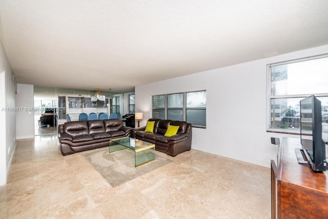 living room featuring a textured ceiling