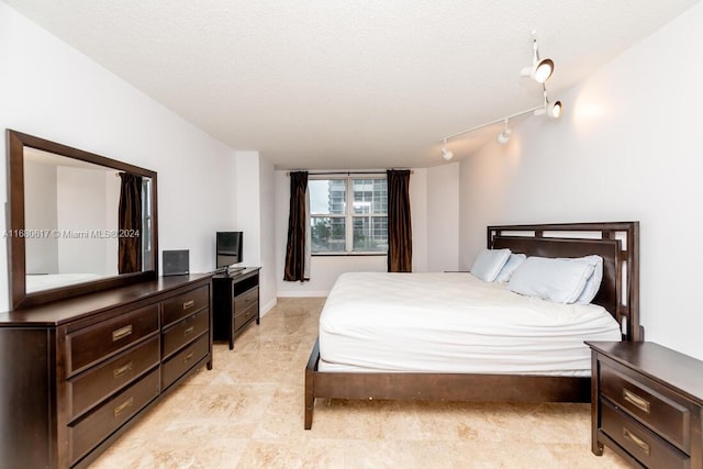 bedroom with a textured ceiling