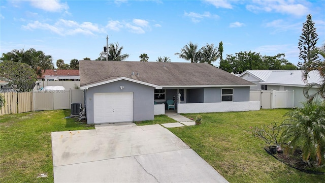 ranch-style house with a front yard, central AC, and a garage