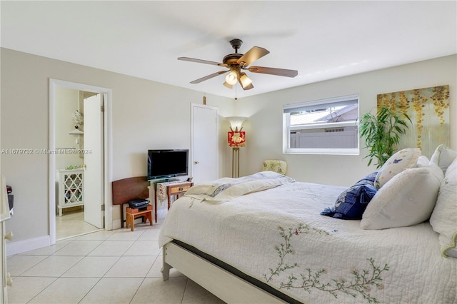 tiled bedroom with ceiling fan