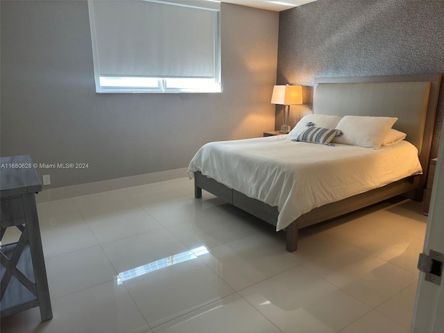 bedroom featuring tile patterned floors