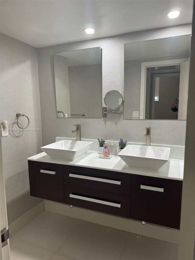 bathroom with vanity and tile patterned flooring