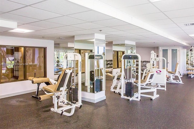 gym with a drop ceiling