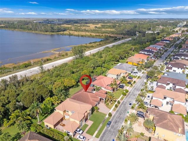 drone / aerial view featuring a water view