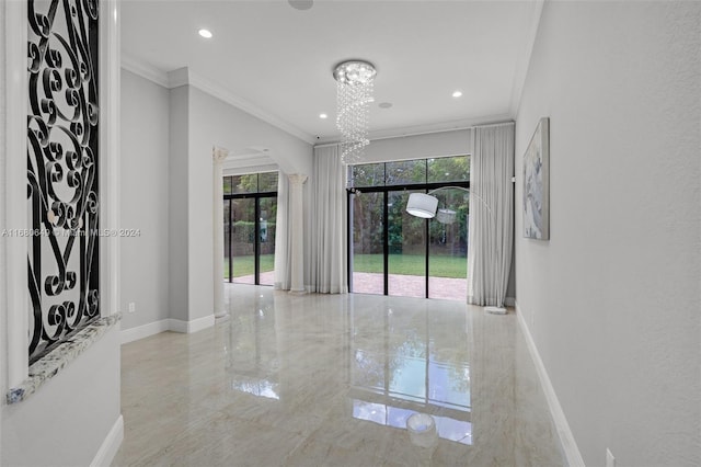 spare room featuring crown molding