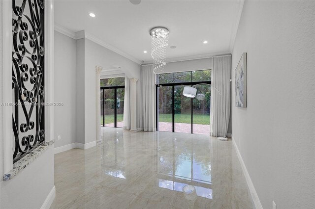 2294 SW 195th Ave, Miramar, FL 33029 - empty room with ornamental molding, baseboards, a chandelier, recessed lighting, and marble tiled floors