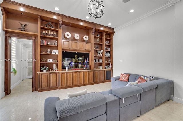 living room with crown molding and a chandelier