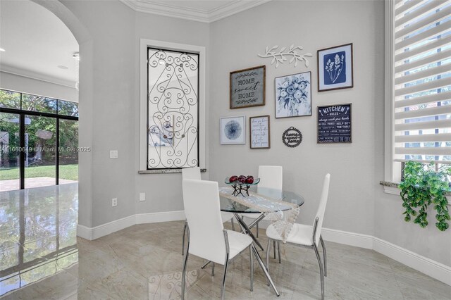 2294 SW 195th Ave, Miramar, FL 33029 - dining room with ornamental molding, arched walkways, and baseboards