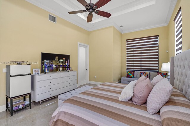 2294 SW 195th Ave, Miramar, FL 33029 - bedroom featuring fridge, ornamental molding, baseboards, a tray ceiling, and ceiling fan