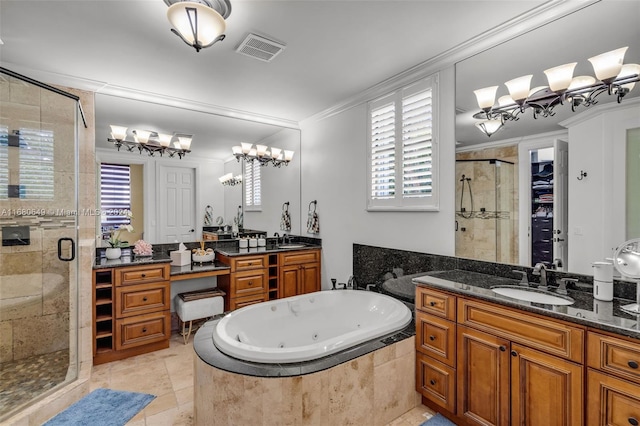 bathroom with tile patterned floors, crown molding, vanity, and independent shower and bath