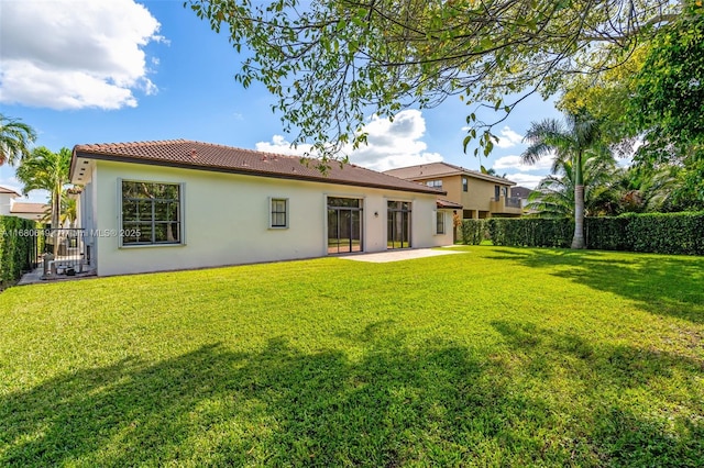 2294 SW 195th Ave, Miramar, FL 33029 - back of property featuring stucco siding, a patio, and a tiled roof