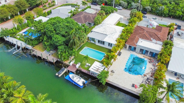 birds eye view of property featuring a water view