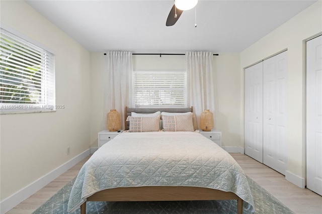 bedroom featuring light hardwood / wood-style floors and ceiling fan