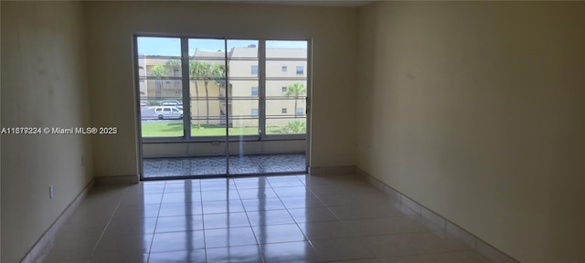 view of tiled spare room