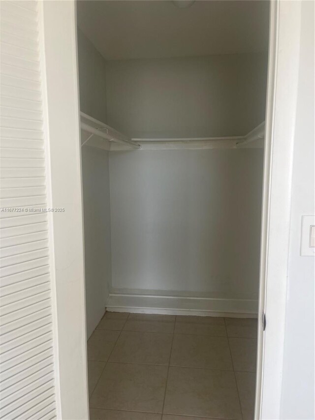 8285 Sunrise Lakes Blvd Unit 308, Sunrise, FL 33322 - half bath with toilet, tile patterned flooring, and vanity