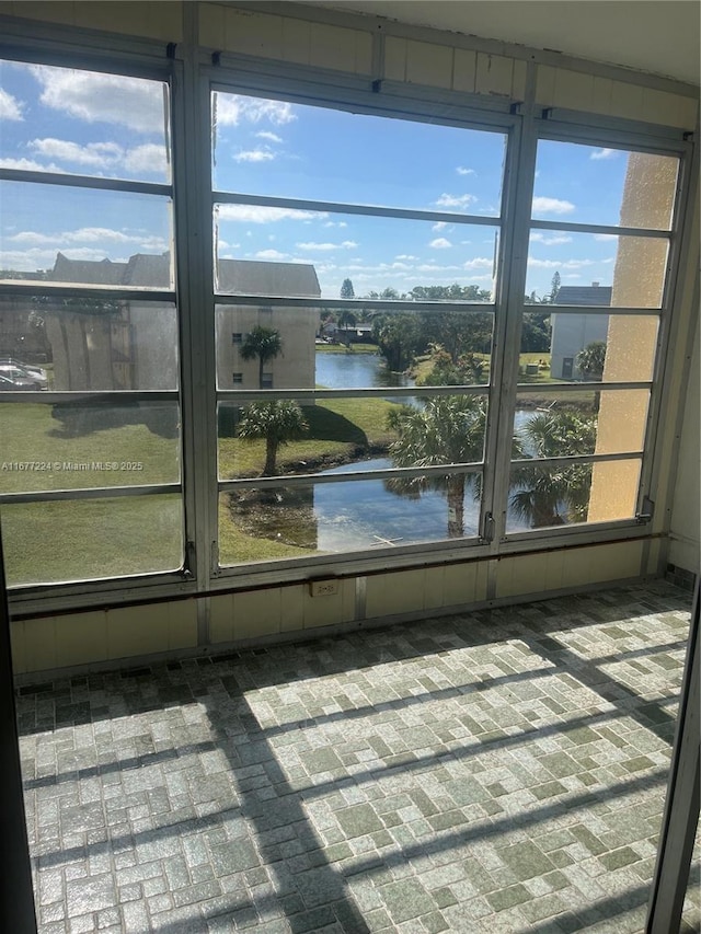 8285 Sunrise Lakes Blvd Unit 308, Sunrise, FL 33322 - unfurnished sunroom with a water view