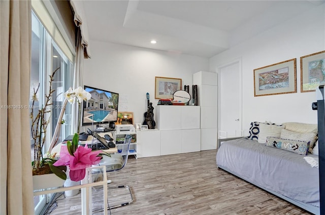 interior space with plenty of natural light and light hardwood / wood-style floors